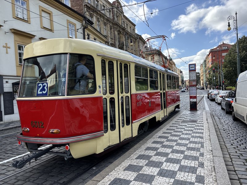 Red and white T3 tram on nostalgic route 23